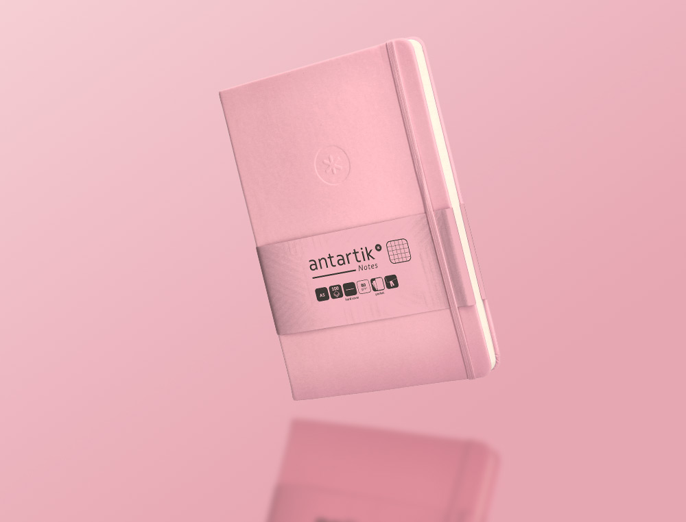 CUADERNO CON GOMILLA ANTARTIK NOTES TAPA DURA A5 HOJAS CUADRICULA ROSA PASTEL 100 HOJAS 80 GR FSC